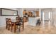 Open dining area with a view into the kitchen, seamlessly blending living and cooking spaces at 7921 E Bonita Dr, Scottsdale, AZ 85250