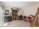Spacious room showcasing natural light, a bookcase, and a decorative desk with rolling chair at 7921 E Bonita Dr, Scottsdale, AZ 85250