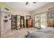 Bright main bedroom featuring eclectic decor, tile flooring and patio access at 7921 E Bonita Dr, Scottsdale, AZ 85250