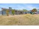 Large backyard with patio area, playground set, and well-maintained landscaping at 845 W Shannon St, Chandler, AZ 85225
