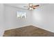 Neutral bedroom with ceiling fan, window, and fresh paint at 845 W Shannon St, Chandler, AZ 85225