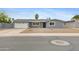 Charming single-story home with a well-maintained xeriscaped front yard and a convenient two-car garage at 845 W Shannon St, Chandler, AZ 85225