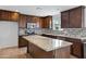 Beautiful kitchen featuring granite countertops, stainless appliances, tile backsplash and ample cabinet space at 845 W Shannon St, Chandler, AZ 85225
