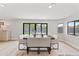 Bright dining room with stylish table and seating with views of the private back yard at 8544 E Heatherbrae Dr, Scottsdale, AZ 85251