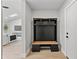 Inviting entryway with a stylish hall tree and seamless access to the living area at 8544 E Heatherbrae Dr, Scottsdale, AZ 85251