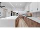 Spacious kitchen features modern cabinets, a large island, and stainless steel appliances at 8544 E Heatherbrae Dr, Scottsdale, AZ 85251
