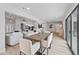 Open floor plan features stylish dining area seamlessly connecting to the comfortable living space at 8544 E Heatherbrae Dr, Scottsdale, AZ 85251