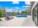 Inviting pool with lounge chairs on the patio and desert landscaping, perfect for relaxation at 8544 E Heatherbrae Dr, Scottsdale, AZ 85251