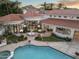Expansive property showcasing the pool, landscaped grounds, and architecture against a mountain backdrop at 8815 N 65Th St, Paradise Valley, AZ 85253