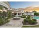 Expansive backyard with a beautiful fountain, lush landscaping, and a sparkling pool at 8815 N 65Th St, Paradise Valley, AZ 85253