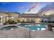 Backyard with in-ground pool, spa, and manicured landscaping, perfect for outdoor enjoyment at 8815 N 65Th St, Paradise Valley, AZ 85253