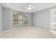 Bright bedroom featuring shuttered window, ceiling fan at 8815 N 65Th St, Paradise Valley, AZ 85253