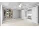 Bright bedroom featuring shuttered window, ceiling fan and ensuite bathroom at 8815 N 65Th St, Paradise Valley, AZ 85253