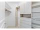 Spacious walk-in closet with custom shelving and storage solutions for organization at 8815 N 65Th St, Paradise Valley, AZ 85253