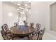 Elegant dining room with a large round table, chandelier, and an inviting atmosphere at 8815 N 65Th St, Paradise Valley, AZ 85253