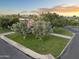 Beautiful exterior view with well-maintained lawn and greenery in a serene neighborhood setting at 8815 N 65Th St, Paradise Valley, AZ 85253