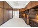 Elegant office with custom built-ins offering ample storage and desk space, with an open doorway at 8815 N 65Th St, Paradise Valley, AZ 85253