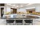 Bright open kitchen with stainless steel appliances, large island and granite countertops at 8815 N 65Th St, Paradise Valley, AZ 85253