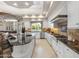 Bright kitchen features granite countertops, a large island with bar seating and stainless steel appliances at 8815 N 65Th St, Paradise Valley, AZ 85253