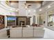 Bright living room features vaulted ceilings, a fireplace, and large windows for lots of natural light at 8815 N 65Th St, Paradise Valley, AZ 85253