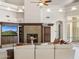 Bright living room with a stone fireplace, recessed lighting, and comfortable seating at 8815 N 65Th St, Paradise Valley, AZ 85253