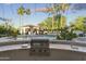 Built-in outdoor grill and sink offering a convenient space for cooking and entertaining at 8815 N 65Th St, Paradise Valley, AZ 85253