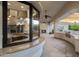 Well-equipped outdoor kitchen featuring a granite countertop and stainless steel grill at 8815 N 65Th St, Paradise Valley, AZ 85253