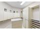 Large walk-in closet with custom built-in cabinets, shelves, drawers, and hanging storage at 8815 N 65Th St, Paradise Valley, AZ 85253