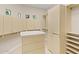 Spacious walk-in closet features custom shelving, drawer units, and natural light at 8815 N 65Th St, Paradise Valley, AZ 85253