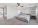 Large bedroom features ample space, ceiling fan, natural light, with neutral color scheme for versatile decor at 894 S Buena Vista Dr, Apache Junction, AZ 85120