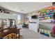 bedroom features bright decor, a playful design, and lots of space for creativity and storage at 894 S Buena Vista Dr, Apache Junction, AZ 85120
