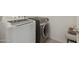 Laundry room with new washer and dryer, offering modern convenience for efficient household tasks at 894 S Buena Vista Dr, Apache Junction, AZ 85120