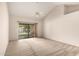 Bright bedroom featuring a ceiling fan and sliding glass doors to the outdoor space at 9120 W Wescott Dr, Peoria, AZ 85382