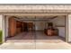 Spacious garage features storage cabinets and a utility sink at 9120 W Wescott Dr, Peoria, AZ 85382