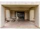 Covered patio area with seating, ideal for outdoor dining and entertaining at 9120 W Wescott Dr, Peoria, AZ 85382
