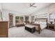 Spacious main bedroom with vaulted ceilings, bay window, and plush carpeting at 9414 S La Rosa Dr, Tempe, AZ 85284