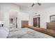 Comfortable main bedroom that provides a view to the bathroom at 9414 S La Rosa Dr, Tempe, AZ 85284