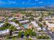 Aerial view of the community showing a sparkling pool and amenities surrounded by lush landscaping at 9450 E Becker Ln # 1071, Scottsdale, AZ 85260