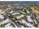 Aerial view of community featuring lush greenery, walkways, and a community pool at 9450 E Becker Ln # 1071, Scottsdale, AZ 85260