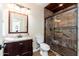 Bathroom featuring a walk-in shower with decorative tiles, a new vanity, and new fixtures at 9450 E Becker Ln # 1071, Scottsdale, AZ 85260