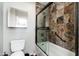 Bathroom with large shower featuring decorative tile, glass enclosure, and hand shower faucet at 9450 E Becker Ln # 1071, Scottsdale, AZ 85260