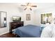 Cozy bedroom with hardwood floors and light walls, and nice natural lighting at 9450 E Becker Ln # 1071, Scottsdale, AZ 85260