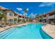 Refreshing community pool with gradual entry steps and plenty of lounge chairs for residents to enjoy at 9450 E Becker Ln # 1071, Scottsdale, AZ 85260