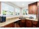 Kitchen counter with stainless steel appliances, granite countertops, and wood cabinets at 9450 E Becker Ln # 1071, Scottsdale, AZ 85260