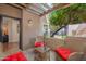 Relaxing patio with wicker furniture and a wine-ready table, perfect for enjoying the outdoors at 9450 E Becker Ln # 1071, Scottsdale, AZ 85260
