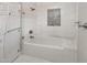 Modern bathtub in a bright bathroom with a glass screen and modern finishes at 9551 E Redfield Rd # 1061, Scottsdale, AZ 85260