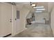 A well-lit garage with painted concrete floors, ample space and all major utilities in the background at 9551 E Redfield Rd # 1061, Scottsdale, AZ 85260