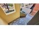 Entryway with a view of the staircase, decorative tile, and courtyard at 9551 E Redfield Rd # 1061, Scottsdale, AZ 85260