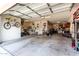 Spacious three car garage with ample storage and unique decor at 9677 W Patrick Ln, Peoria, AZ 85383
