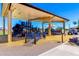 Well-equipped community playground with various play structures and shaded areas at 9677 W Patrick Ln, Peoria, AZ 85383